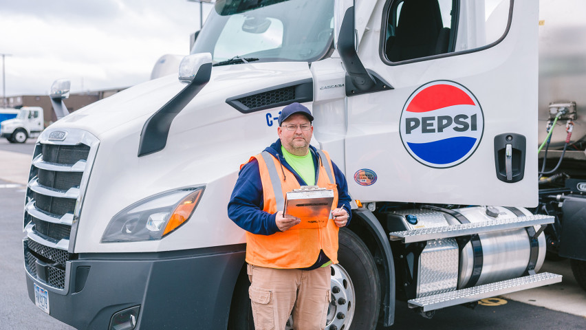 CDL Driver standing in front of Pepsi delivery truck