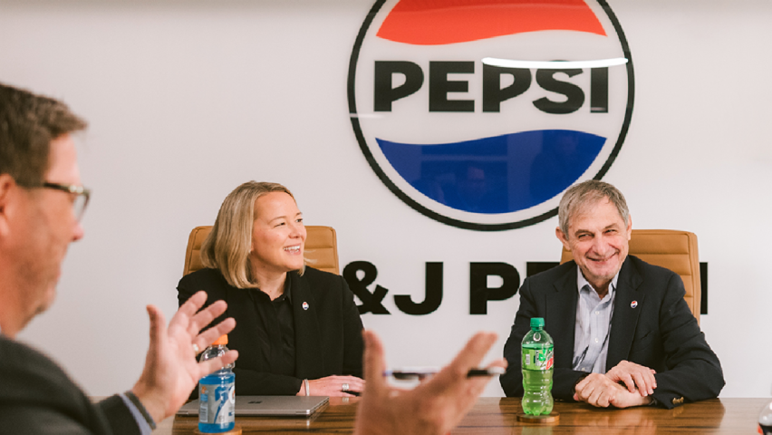 Leadership talking around a table